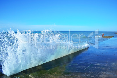 Powerful waves of the sea foam