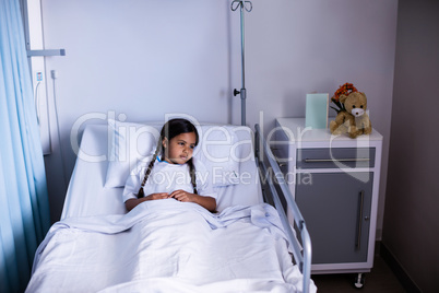 Patient lying on bed