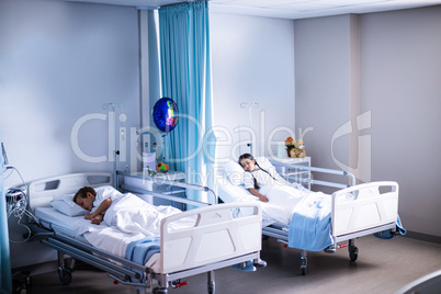 Patients sleeping on the bed