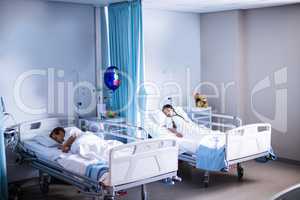 Patients sleeping on the bed
