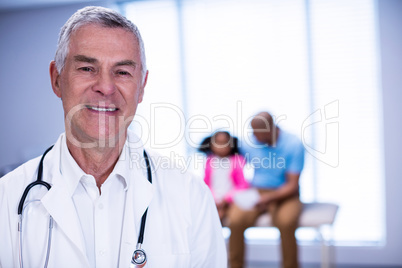 Portrait of smiling male doctor