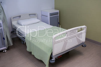 Empty bed in ward at hospital