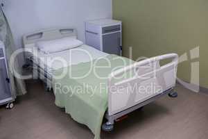 Empty bed in ward at hospital