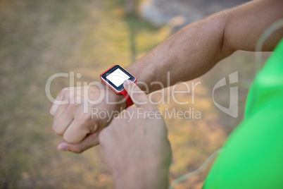Jogger setting a smartwatch