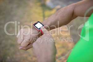 Jogger setting a smartwatch