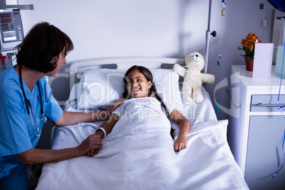 Doctor interacting with patient