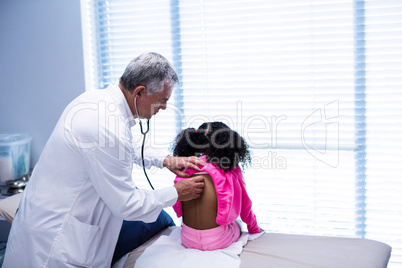 Doctor examining a patient