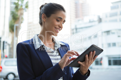 Business executive using digital tablet