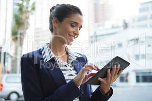 Business executive using digital tablet