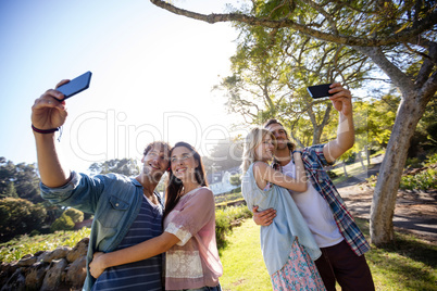 Couples clicking a selfie in park