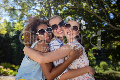 Female friends embracing each other