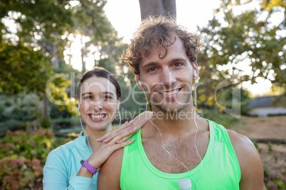 Couple smiling in park