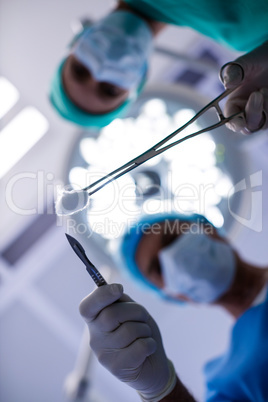 Surgeons performing operation in operation theater