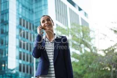 Business executive talking on mobile phone