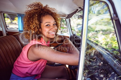 Woman sitting in campervan