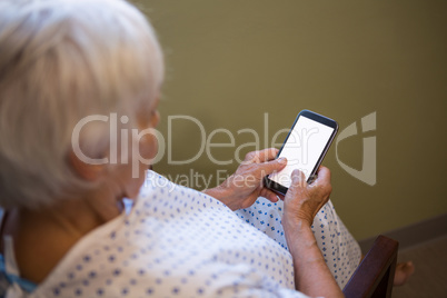 Senior patient using mobile phone