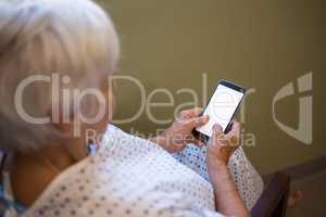 Senior patient using mobile phone
