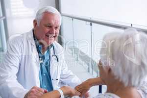 Doctor interacting with senior patient