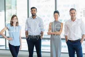 Business executives standing in office