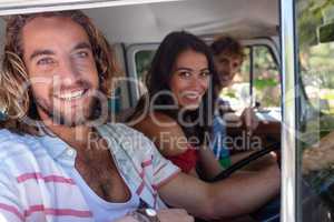 Friends travelling in campervan