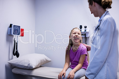 Doctor interacting with patient