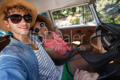 Couple travelling in campervan