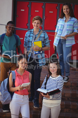 Students standing on staircase