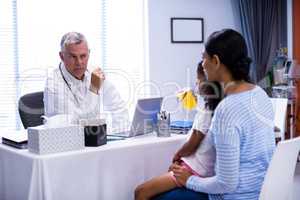 Doctor and patient interacting with each other