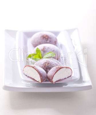 The colorful mochi dessert ice cream on wood plate