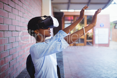 Schoolgirl using virtual reality headset