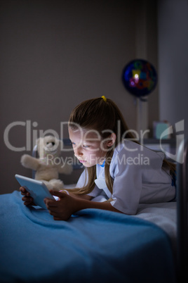 Patient using digital tablet in ward