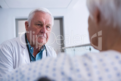 Doctor interacting with senior patient