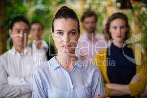 Business executives standing in office