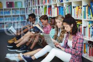 Attentive students studying in library