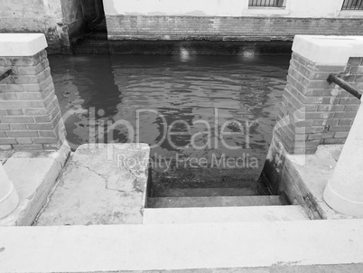 Water canal in Venice in black and white