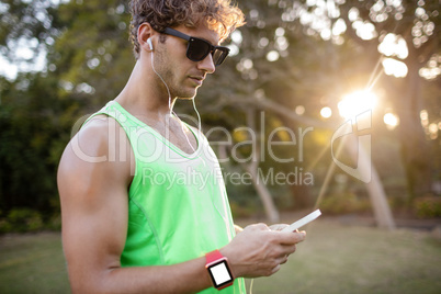 Man listening to music on mobile phone