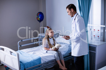 Doctor interacting with patient