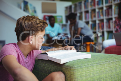 Attentive student studying in library