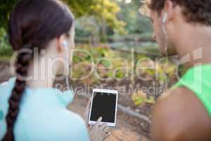 Couple listening to music on smartphone