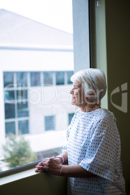 Senior patient standing at hospital