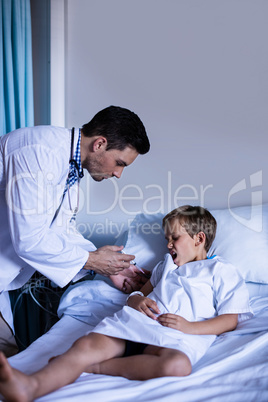 Male doctor injecting patient