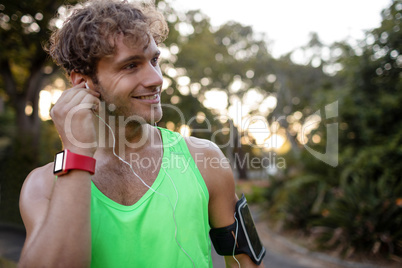 Man listening to music while jogging