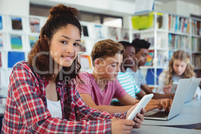 Students using laptop, digital tablet