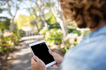 Man using digital tablet