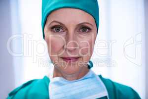 Portrait of female surgeon standing in operation theater