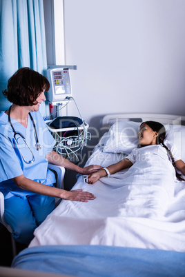 Doctor interacting with patient