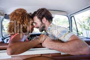 Couple holding hands in campervan