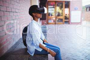 Schoolgirl using virtual reality headset