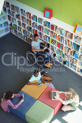 Attentive students studying in library