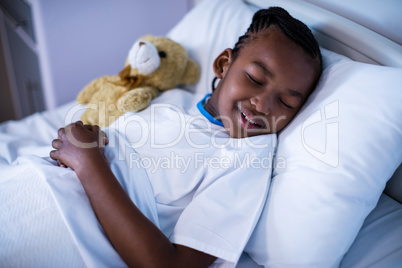 Patient sleeping with teddy bear